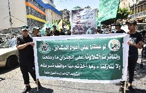 Members of the Palestinian Joint Action Committee Hold Rally and Symbolic Funeral for Late Hamas Leader Ismail Haniyeh In Beirut