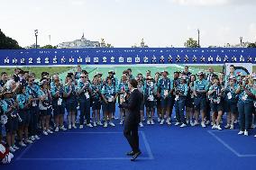 Emmanuel Macron meets volonteers during archery competitions at Invalides