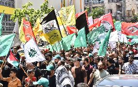 Members of the Palestinian Joint Action Committee Hold Rally and Symbolic Funeral for Late Hamas Leader Ismail Haniyeh In Beirut