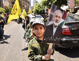 Members of the Palestinian Joint Action Committee Hold Rally and Symbolic Funeral for Late Hamas Leader Ismail Haniyeh In Beirut