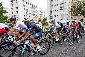 The Pack Of Riders Cycles During The Men's Cycling Road Race