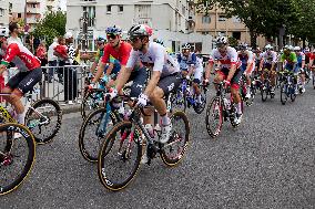 The Pack Of Riders Cycles During The Men's Cycling Road Race