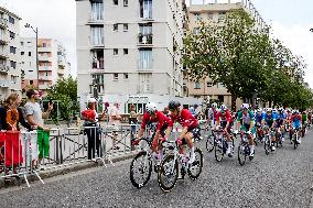 The Pack Of Riders Cycles During The Men's Cycling Road Race