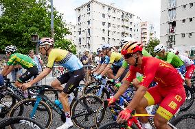 The Pack Of Riders Cycles During The Men's Cycling Road Race