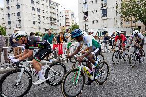 The Pack Of Riders Cycles During The Men's Cycling Road Race