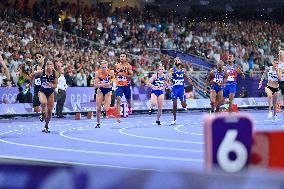 Paris 2024 - Netherlands celebrate winning the 4x4 mixed relay final