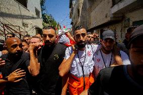 Funeral of Palestinian paramedic to wounds by Israeli attack - West Bank