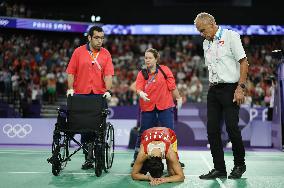 Paris 2024 - Carolina Marin of Spain suffers an injury during badminton women's singles