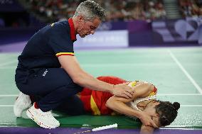 Paris 2024 - Carolina Marin of Spain suffers an injury during badminton women's singles