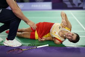 Paris 2024 - Carolina Marin of Spain suffers an injury during badminton women's singles