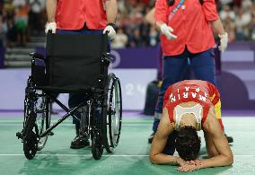 Paris 2024 - Carolina Marin of Spain suffers an injury during badminton women's singles