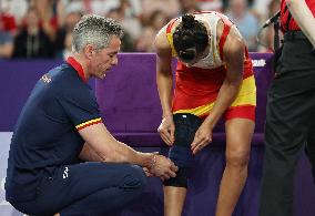 Paris 2024 - Carolina Marin of Spain suffers an injury during badminton women's singles