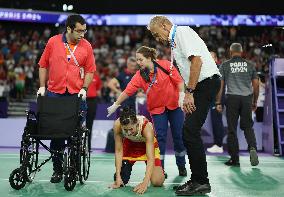 Paris 2024 - Carolina Marin of Spain suffers an injury during badminton women's singles