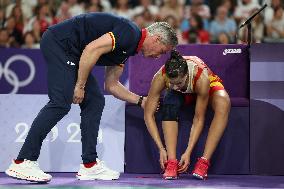 Paris 2024 - Carolina Marin of Spain suffers an injury during badminton women's singles