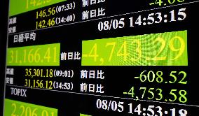 Tokyo stocks tumble