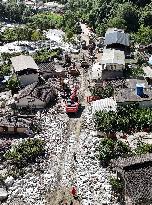 Flash Flood And Mudslide Aftermath In Southwest China