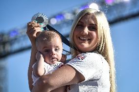 Paris 2024 - Fans welcome medalists at the Parc des Champions in Paris