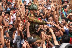 PM Sheikh Hasina Flees Country As Protesters Storm Palace - Dhaka