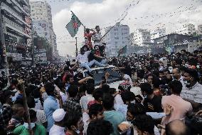 PM Sheikh Hasina Flees Country As Protesters Storm Palace - Dhaka