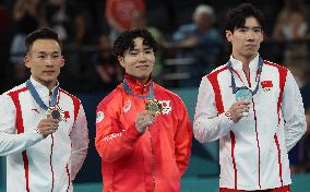 The podium of the mens allround competition. from leftXiao Ruoteb,ronzeZhang Boeng silver both from China and  in the, middle th