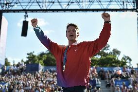 Paris 2024 - Fans cheer medalists at the Parc des Champions in Paris FA