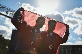 Paris 2024 - Fans cheer medalists at the Parc des Champions in Paris FA