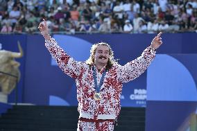 Paris 2024 - Fans cheer medalists at the Parc des Champions in Paris FA