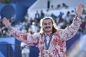 Paris 2024 - Fans cheer medalists at the Parc des Champions in Paris FA
