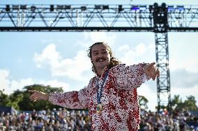 Paris 2024 - Fans cheer medalists at the Parc des Champions in Paris FA