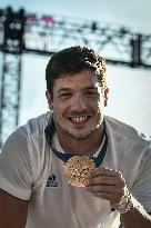 Paris 2024 - Fans cheer medalists at the Parc des Champions in Paris FA