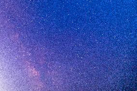 Milky Way Above a Light-Polluted Area