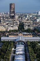 Paris 2024 - Giant Image Of Superstar Leon Marchand Diplayed On The Tour Montparnasse