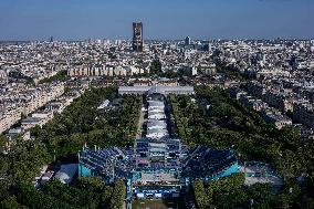 Paris 2024 - Giant Image Of Superstar Leon Marchand Diplayed On The Tour Montparnasse