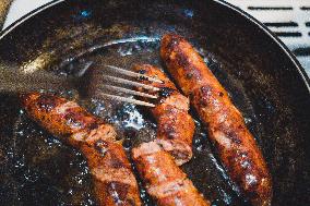 Cooking Scrambled Eggs With Sausages In Chania