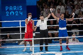 Paris 2024 - Cuba's Alvarez Beats France’s Oumiha In The Men's 63.5kg Final