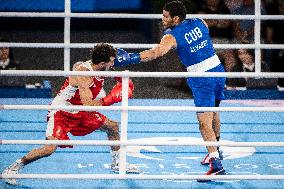 Paris 2024 - Cuba's Alvarez Beats France’s Oumiha In The Men's 63.5kg Final