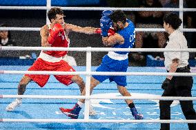 Paris 2024 - Cuba's Alvarez Beats France’s Oumiha In The Men's 63.5kg Final