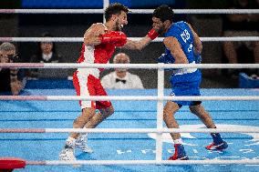 Paris 2024 - Cuba's Alvarez Beats France’s Oumiha In The Men's 63.5kg Final