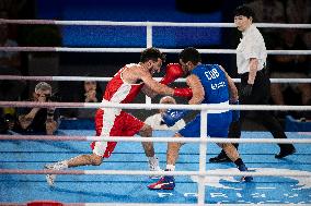 Paris 2024 - Cuba's Alvarez Beats France’s Oumiha In The Men's 63.5kg Final