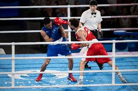 Paris 2024 - Cuba's Alvarez Beats France’s Oumiha In The Men's 63.5kg Final