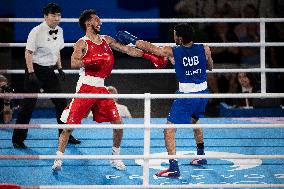 Paris 2024 - Cuba's Alvarez Beats France’s Oumiha In The Men's 63.5kg Final