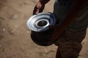 Palestinians Receive Food Rations Amid Conflict