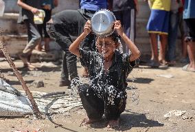 Palestinians Receive Food Rations Amid Conflict