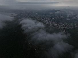 Clouds Hover Over The Mountains During The Monsoon Rain Season In Ajmer