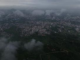 Clouds Hover Over The Mountains During The Monsoon Rain Season In Ajmer