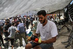 People Receive Food Aid In Jabalia Camp - Gaza