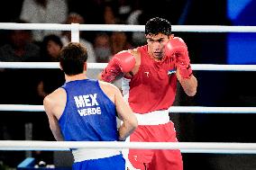 Paris 2024 - Boxing 71kg - Asadkhuja Muydinkhujaev Wins Gold