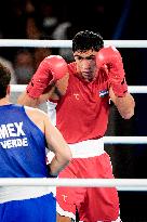 Paris 2024 - Boxing 71kg - Asadkhuja Muydinkhujaev Wins Gold