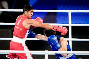 Paris 2024 - Boxing 71kg - Asadkhuja Muydinkhujaev Wins Gold