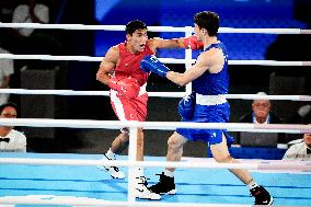 Paris 2024 - Boxing 71kg - Asadkhuja Muydinkhujaev Wins Gold